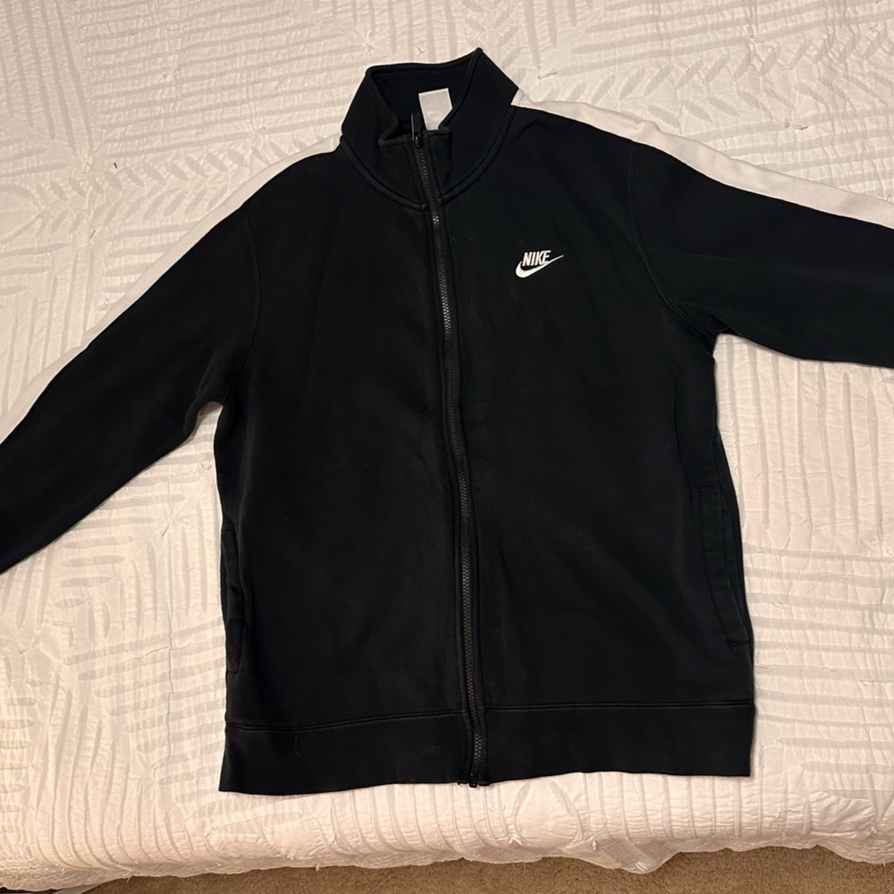 Nike Black Track-style jacket with write stripe down arms. Men’s size L